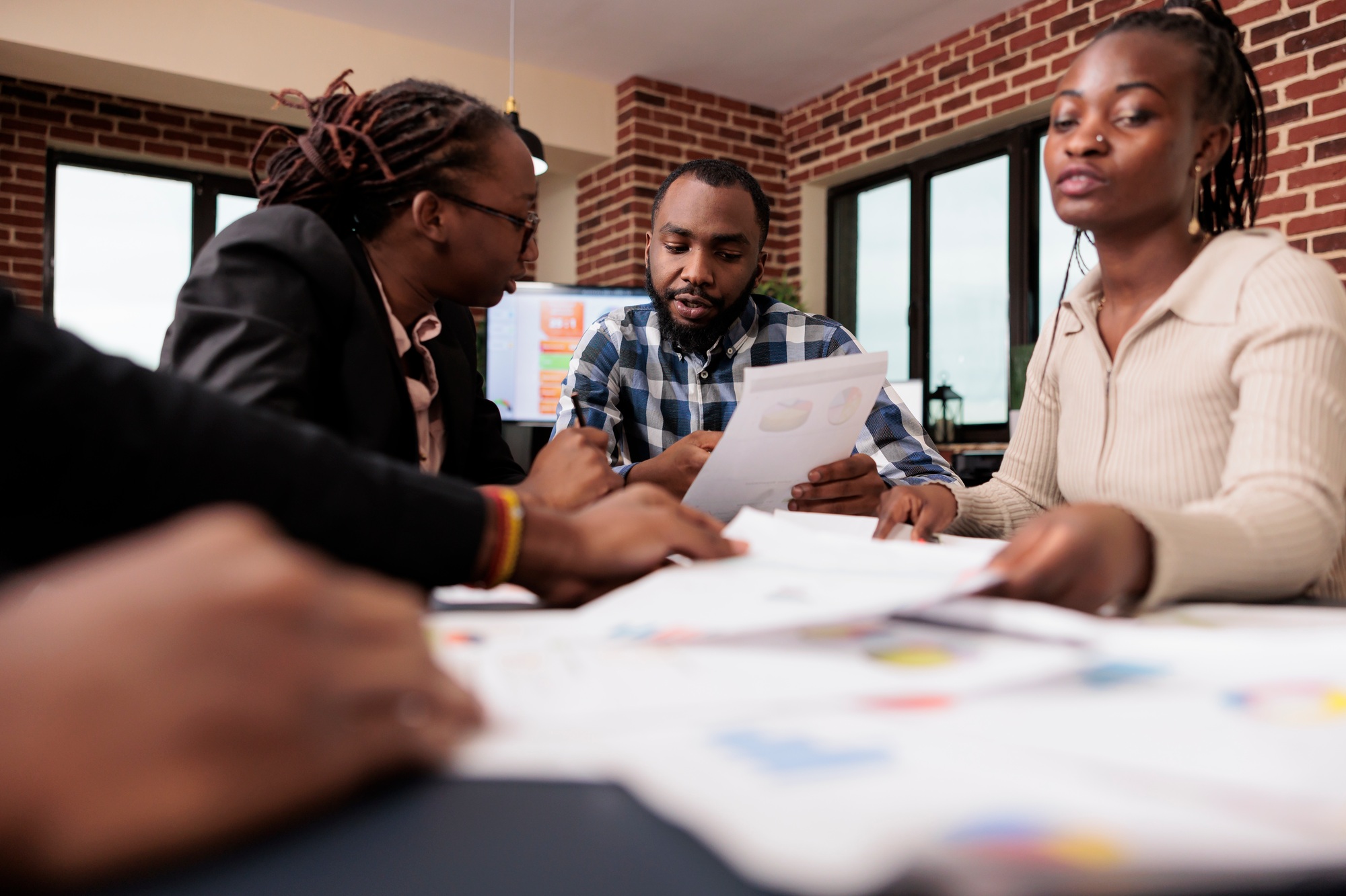 African american people doing teamwork in office